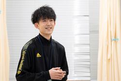 話をする写真